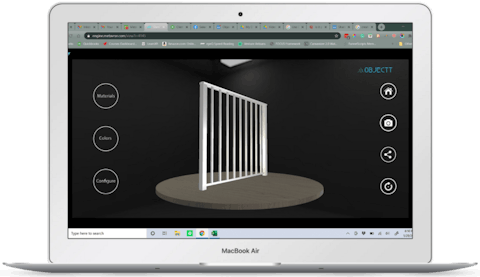 A silver MacBook Air is pictured with a 3D product shown on the screen.